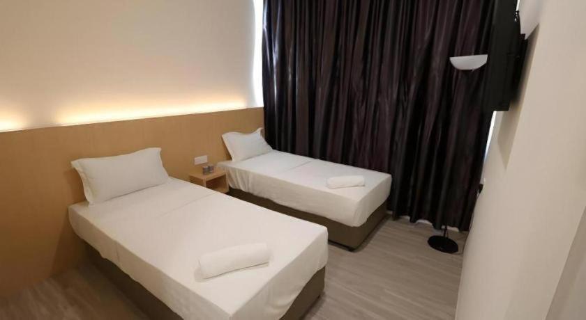 Place2Stay @ Campus Hub Кучинг Экстерьер фото